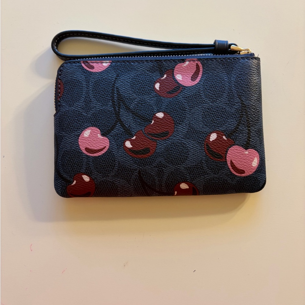 Coach Navy Wristlet with Red Cherry Print